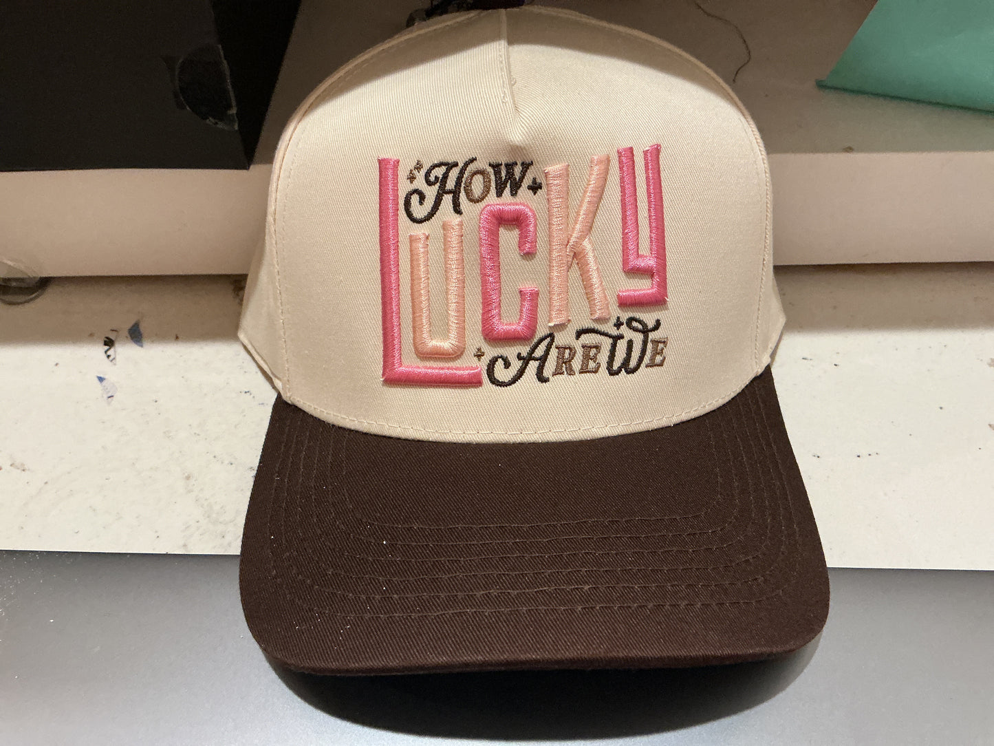 How lucky are we Trucker Hat