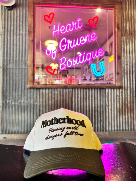 Motherhood: Raising World Changer Trucker Hat