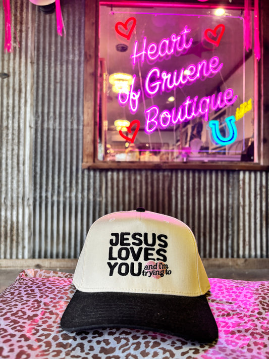 Jesus loves you and... Trucker Hat